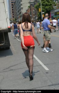 Angie struts outside in nothing but lingerie