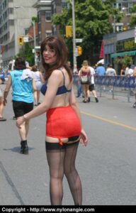 Angie struts outside in nothing but lingerie