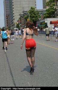 Angie struts outside in nothing but lingerie