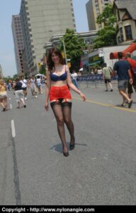 Angie struts outside in nothing but lingerie